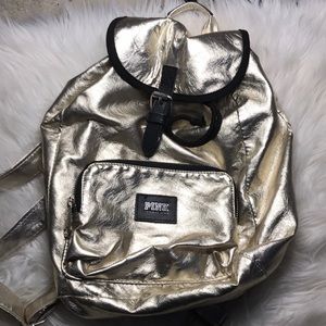 gold and black vs pink mini book bag